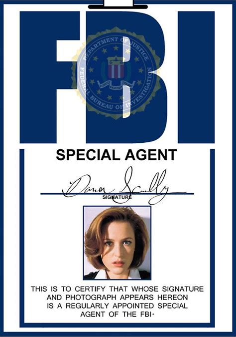 In early seasons the other side was just blank, but later they added the multicolored FBI seal and a barcode below that. It's visible in s08e01, s09e14 and probably other eps. I'm curious if you would also upload the wallet IDs, and very curious what the new X-Files Season 10 badges will look like!
